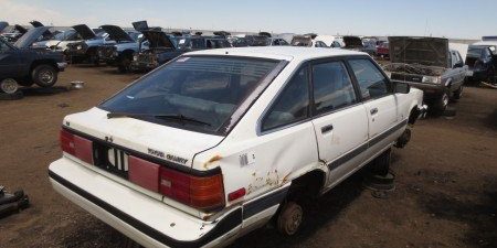 450x337x16-1985-Toyota-Camry-Liftback-Down-On-the-Junkyard-Picture-courtesy-of-Murilee-Martin-450×337.jpg.pagespeed.ic.G8cgT2z8Hy