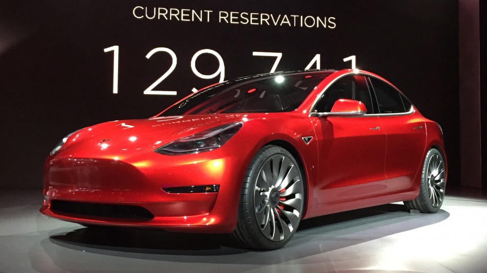 Tesla-Model-3-on-stage-in-red-953×536