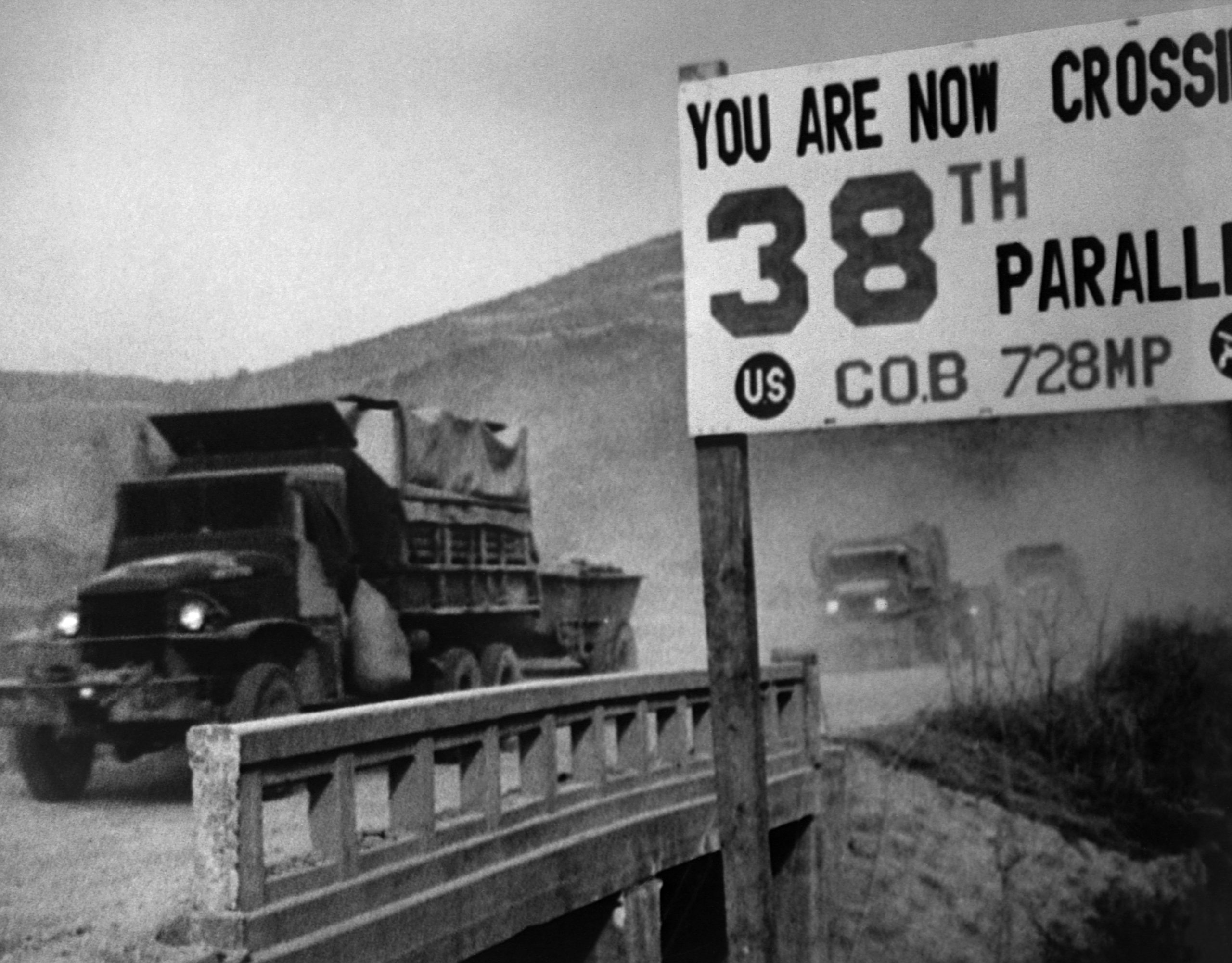 Military Trucks Crossing the 38th Parallel in Korea