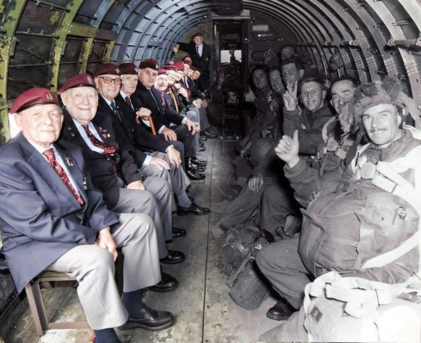 WWII-Paratroopers-sitting-across-from-themselves-in-the-same-plane-that-dropped-them-into-Normandy-in-1944.