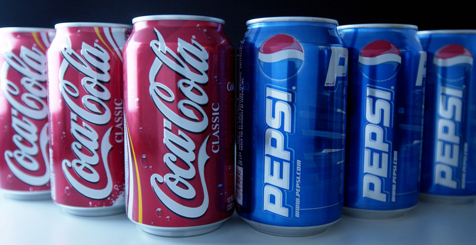 Cans of Pepsi and Coke are set up for a photograph in New Yo