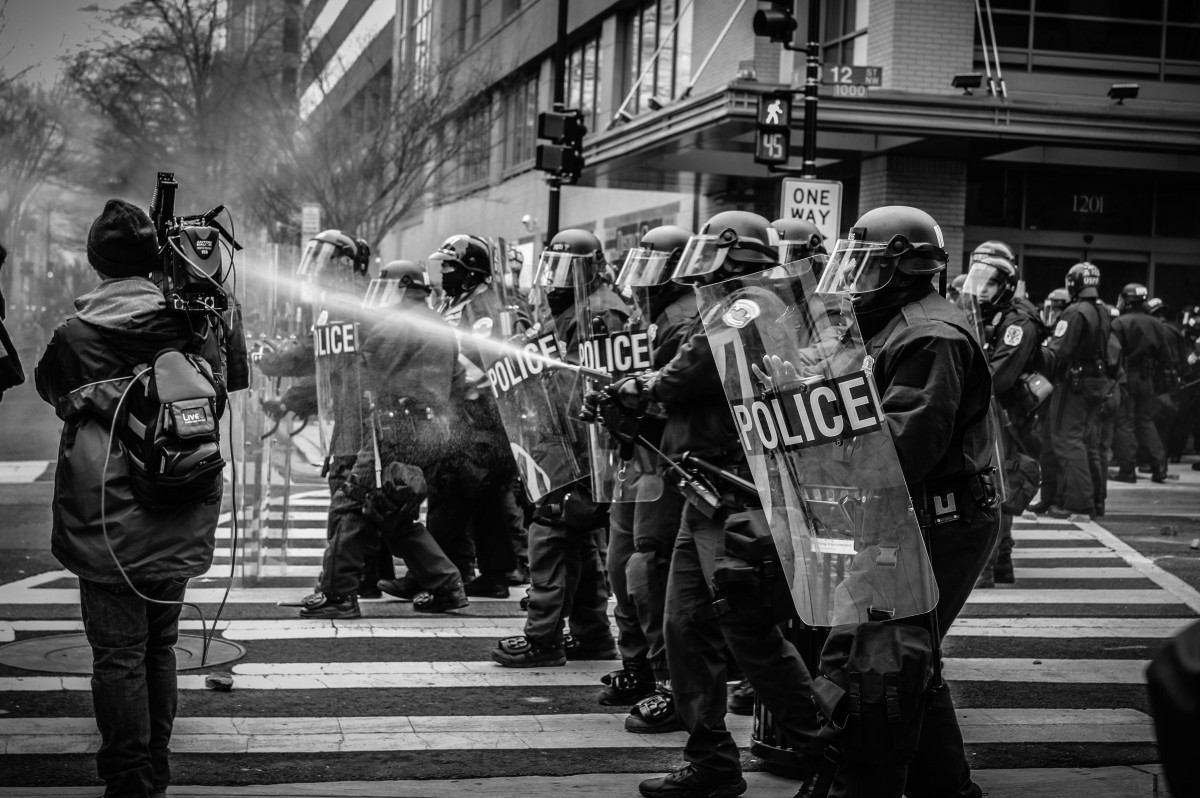 officers_riot_gear_riot_protest_fire_hose-938868