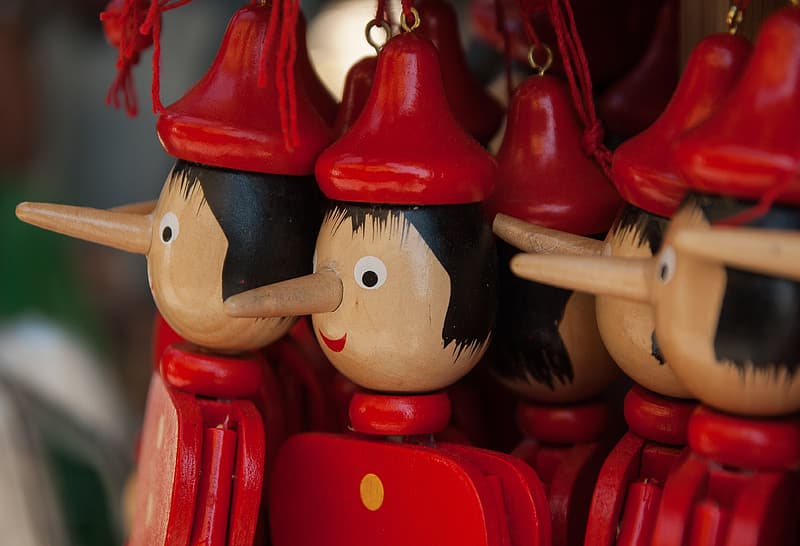selective-focus-photography-of-pinocchio-puppets